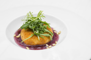 Deep fried crispy camembert cheese on the Trans-Siberian Railway, topped with a raspberry jam.