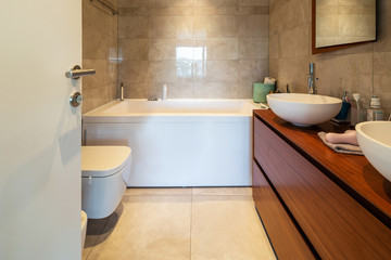 Modern bathroom in a marble designer apartment