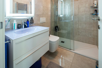 Modern bathroom in a marble designer apartment