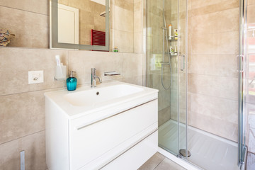 Modern bathroom in a marble designer apartment