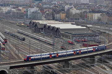 View of Zürich's main station and railway-system with trains going over the bridge