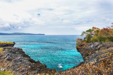 Blue caribbean sea and cliffs