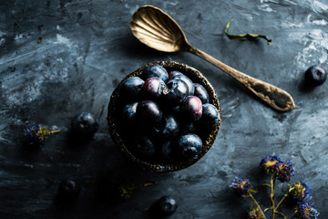 Handmade cup with blueberries.