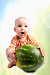 Fototapeta premium Little child with a watermelon, on a white background.
