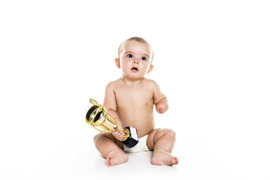 Baby Boy Portrait On White Background With Trophy