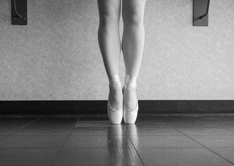 Black and white version of Ballet dancer En pointe in her dance shoes