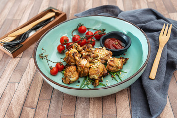 roasted sleeves chicken with potatoes and barbecue sauce