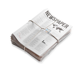 Pile of newspapers on white background