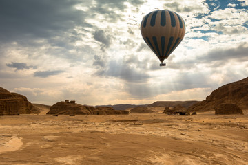 Fototapeta na wymiar Hot Air Balloon travel over desert