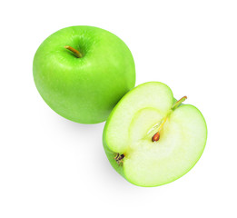 whole and hafl with slice of green apples  isloated on white background