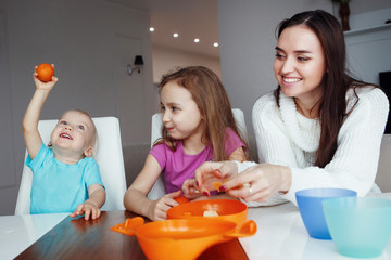 Mother playing with children