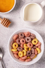 Colorful cereal rings in bowl.