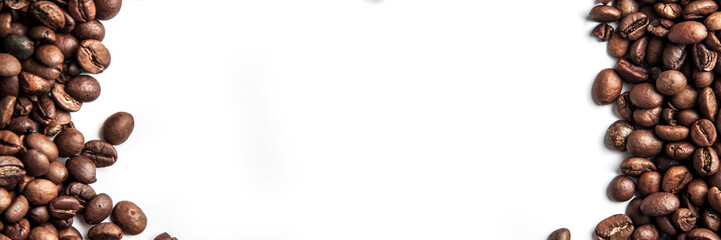 Panoramic background with spilled coffee beans with a white mockup in the middle