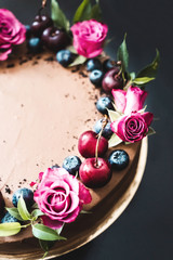chocolate cake with berries and cherries 