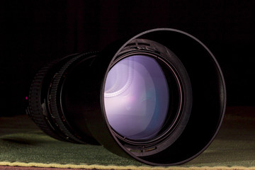 Telephoto lens aperture with nice reflections. Photography vision concept.