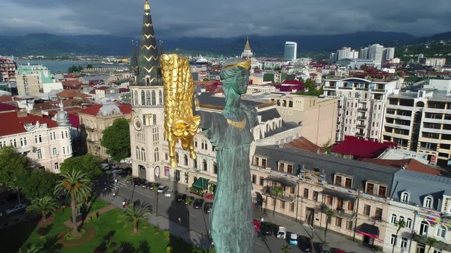 Aerial view. Flying around Medea monument on Europe square in Batumi, Georgia. The sorceress Medea holds a Golden fleece in her hand.