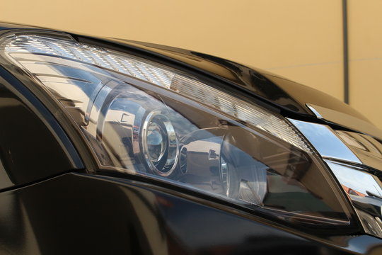 Fototapeta Headlight of a cars