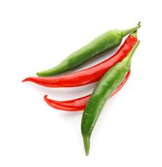 Different chili peppers on white background