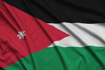 Jordan flag  is depicted on a sports cloth fabric with many folds. Sport team banner