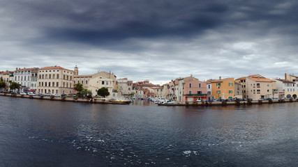 Fototapeta na wymiar Canal in Venice and houses. Panorama