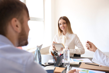 Meeting of business team working in office