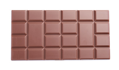 Delicious milk chocolate bar on white background
