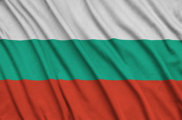 Bulgaria flag  is depicted on a sports cloth fabric with many folds. Sport team banner