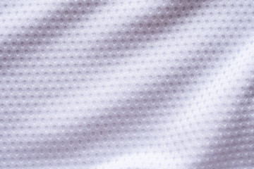 White fabric sport clothing football jersey with air mesh texture background
