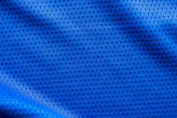 Blue color fabric sport clothing football jersey with air mesh texture background