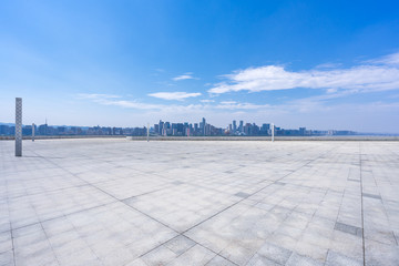 empty square with panoramic city skyline