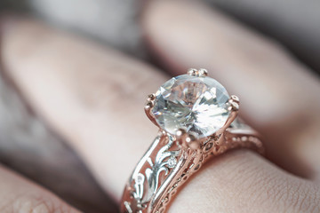 woman hand with jewelry diamond ring on finger