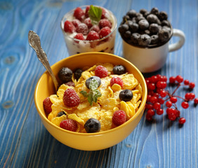 Healthy breakfast. Corn flakes with raspberries and blueberries 