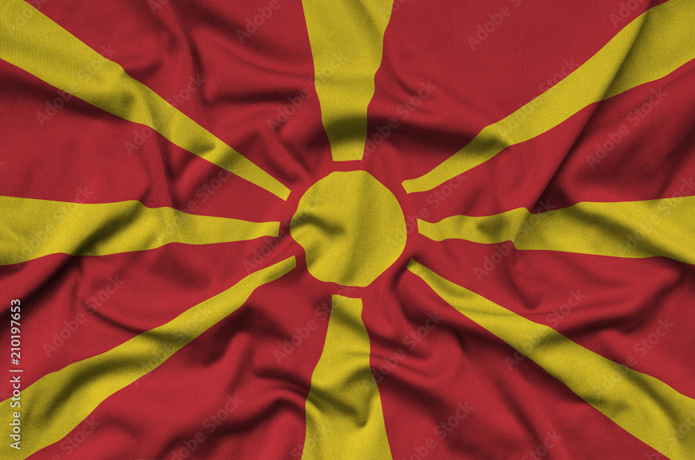 Wall mural Macedonia flag  is depicted on a sports cloth fabric with many folds. Sport team banner