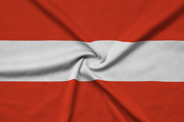 Austria flag  is depicted on a sports cloth fabric with many folds. Sport team banner