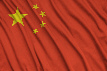 China flag  is depicted on a sports cloth fabric with many folds. Sport team banner