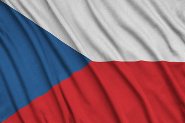 Czech flag  is depicted on a sports cloth fabric with many folds. Sport team banner