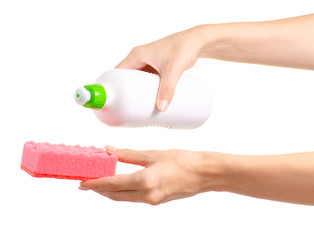 Detergent for utensils and sponge for washing dishes in hand on a white background isolation