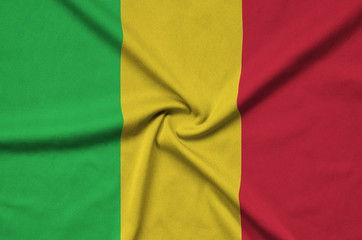 Mali flag  is depicted on a sports cloth fabric with many folds. Sport team banner