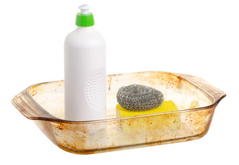 Oily greasy dirty glass dishes with a metal kitchen sponge detergent for utensils on white background isolation