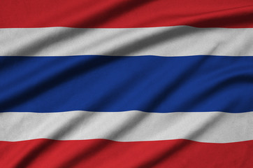 Thailand flag  is depicted on a sports cloth fabric with many folds. Sport team banner