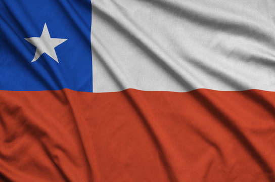 Chile flag is depicted on a sports cloth fabric with many folds. Sport team banner - Powered by Adobe
