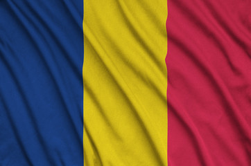 Chad flag  is depicted on a sports cloth fabric with many folds. Sport team banner
