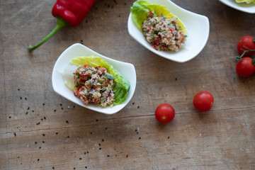 Fresh salad with Bulgur, pepper, Tomatoes and herbs