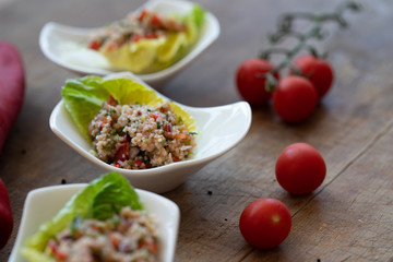 Refreshing Bulgur salad on an old wooden table