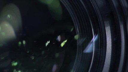 Security camera lens zooming in, close up. Private property protection and public surveillance concept.