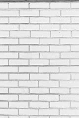 Naklejka premium Bright White Brick Wall in Vertical Format