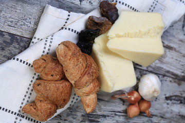 Cheese next to croissant