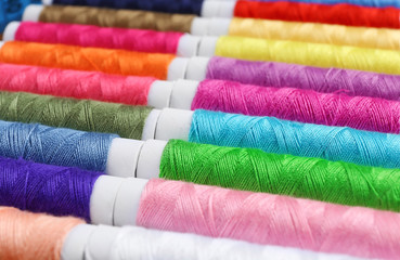 coils of colored strands laid out in a row