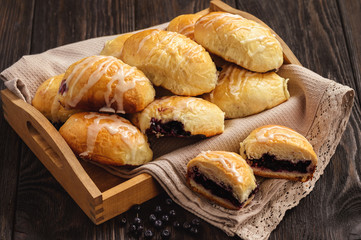 Homemade sweet buns with wild blueberry filling.