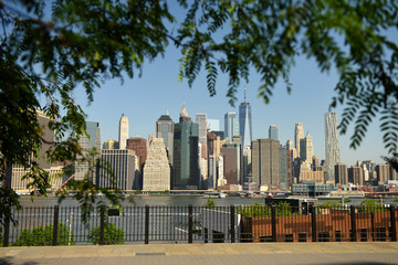 View on financial district in lower Manhattan from Brooklyn Bridge Park, New York.